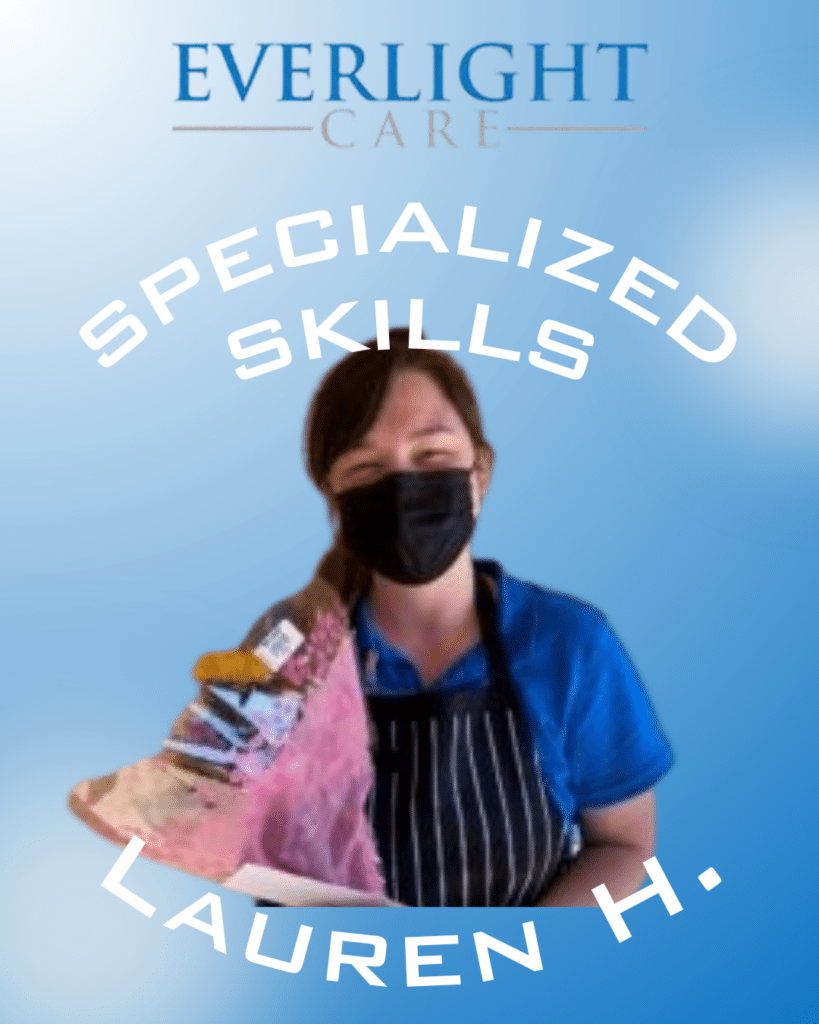Promotional image of a masked caregiver in a blue uniform, holding a pink bouquet, with 'SPECIALIZED SKILLS' arcing above and 'LAUREN H.' below on a blue gradient background (Everlight Care).